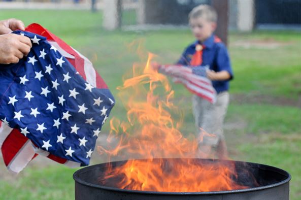 Burns American Flag for a Year